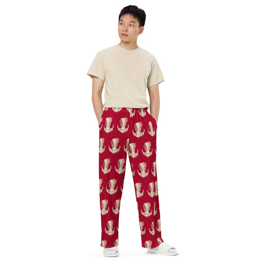 Unisex, medium dark red pants with elastic band and relaxed fit featuring an all over print design with a front facing warthog skull with 3 different kinds of fungi growing out of it