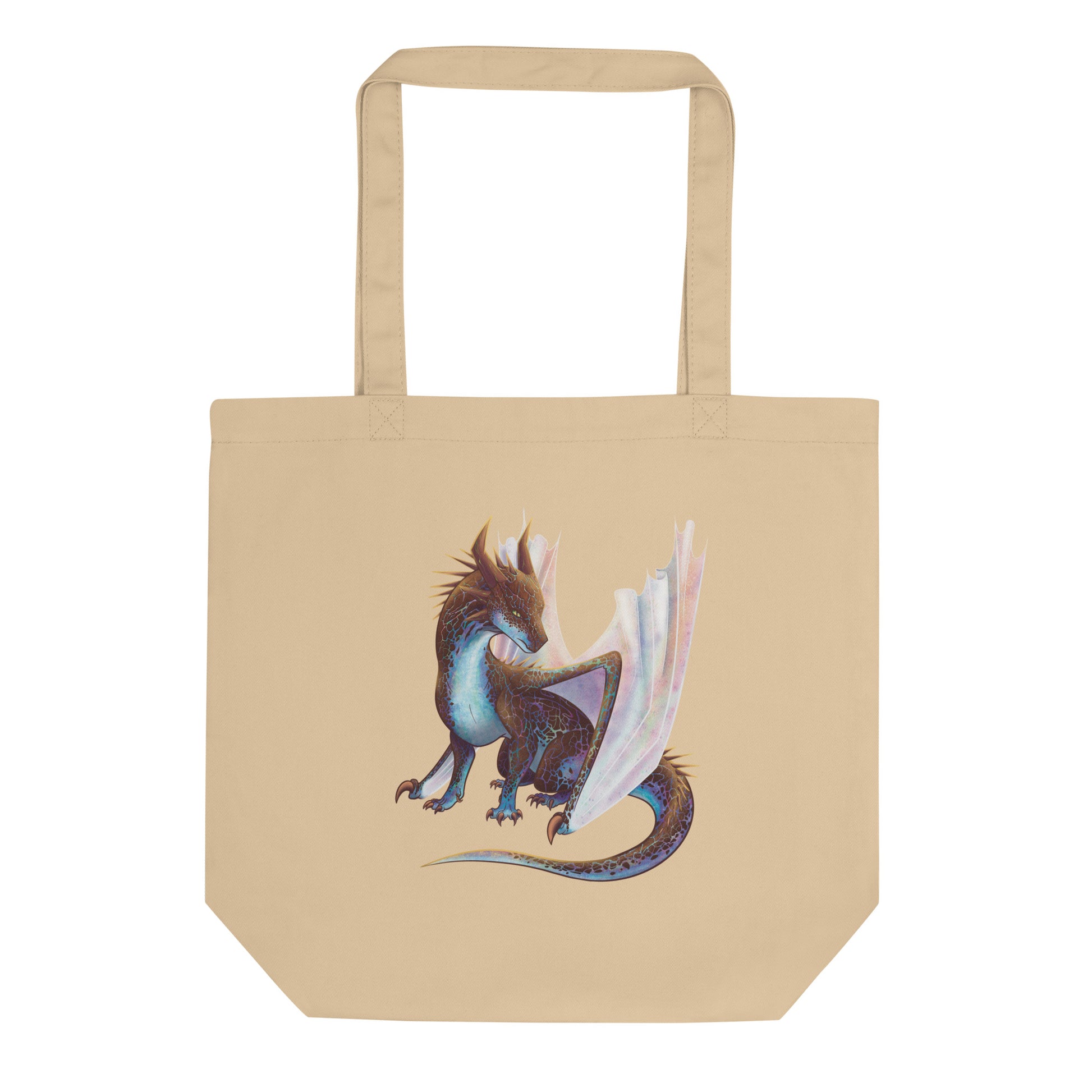 Tan in color tote bag featuring a sitting, side profile of a dragon that has the features of a boulder opal with hues of blue, green, purple, and pink on the underbelly and cracks of the rough, brown hue, rock scales. The wings are tucked back and are of an iridescent shimmery hue