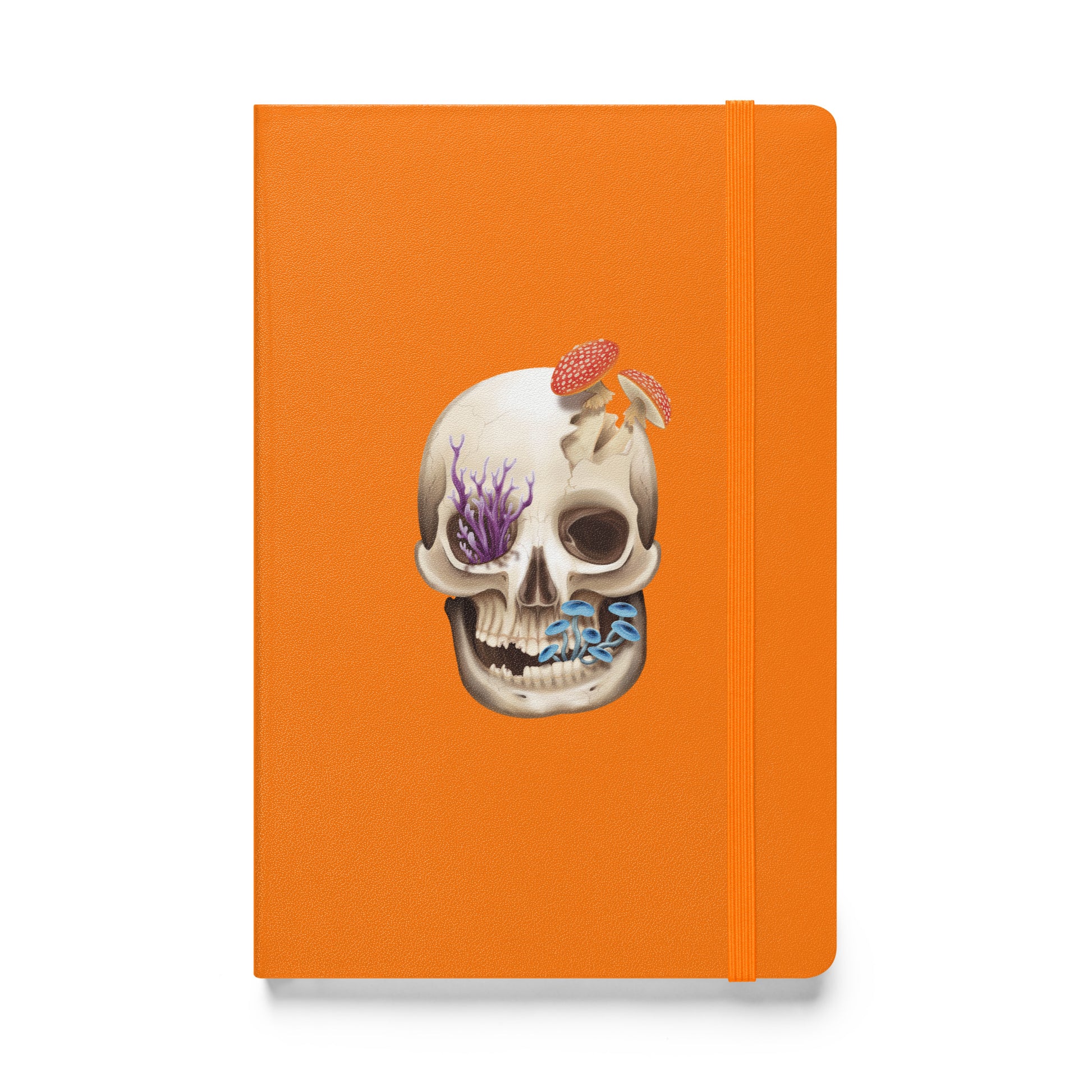 A orange notebook with an elastic closure, 80 lined pages, a ribbon bookmark, and pocket in the back that features a human skull with various fungi growing out of it on the front cover