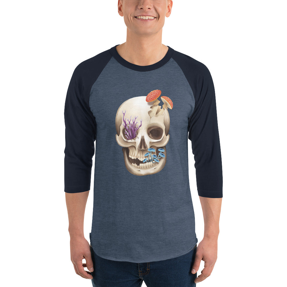 Unisex, heather blue shirt with navy blue 3/4 length sleeves featuring a front facing human skull with 3 different kinds of fungi growing out of it