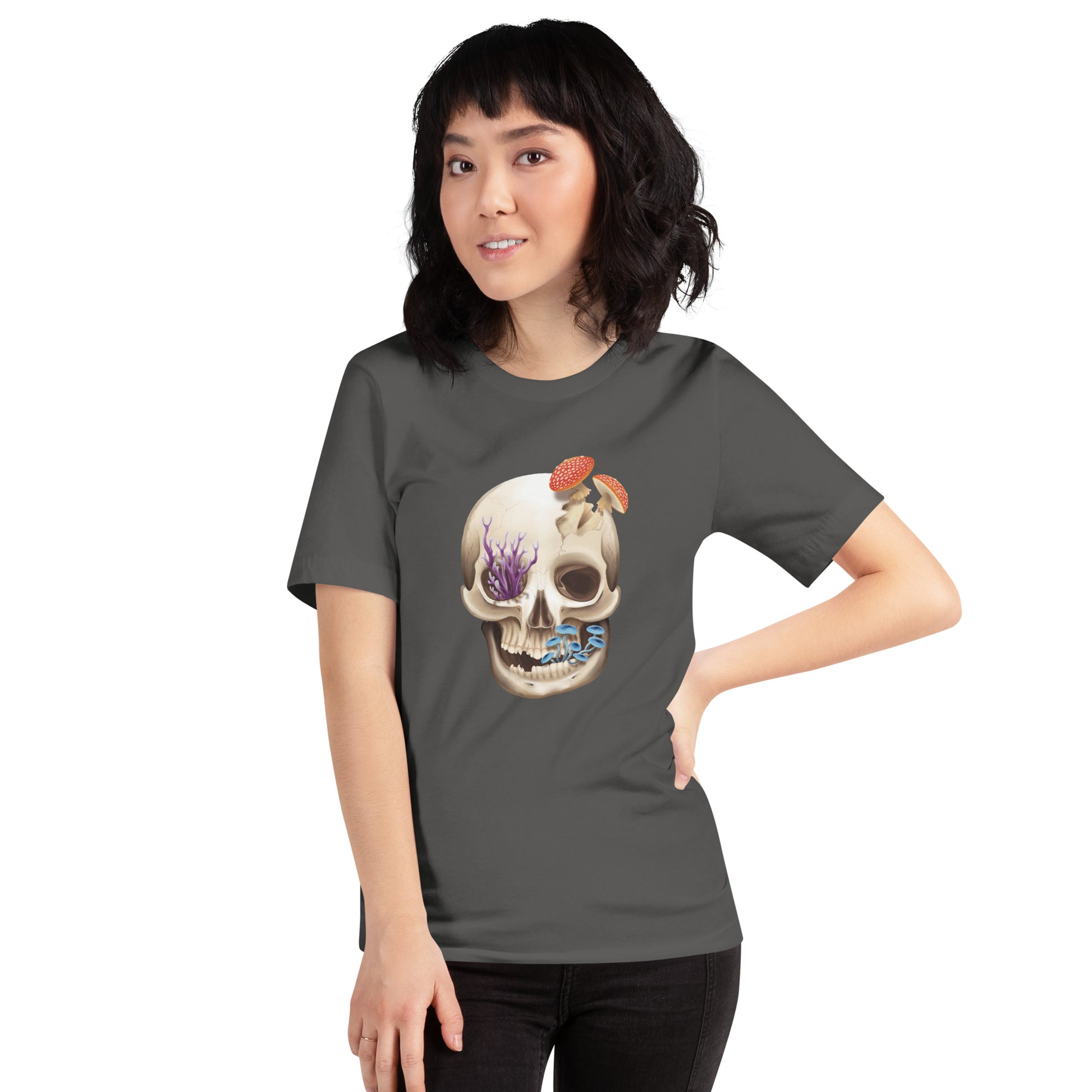 A unisex, asphalt color, adult short sleeve T shirt featuring a front facing human skull with 3 different kinds of fungi growing out of it