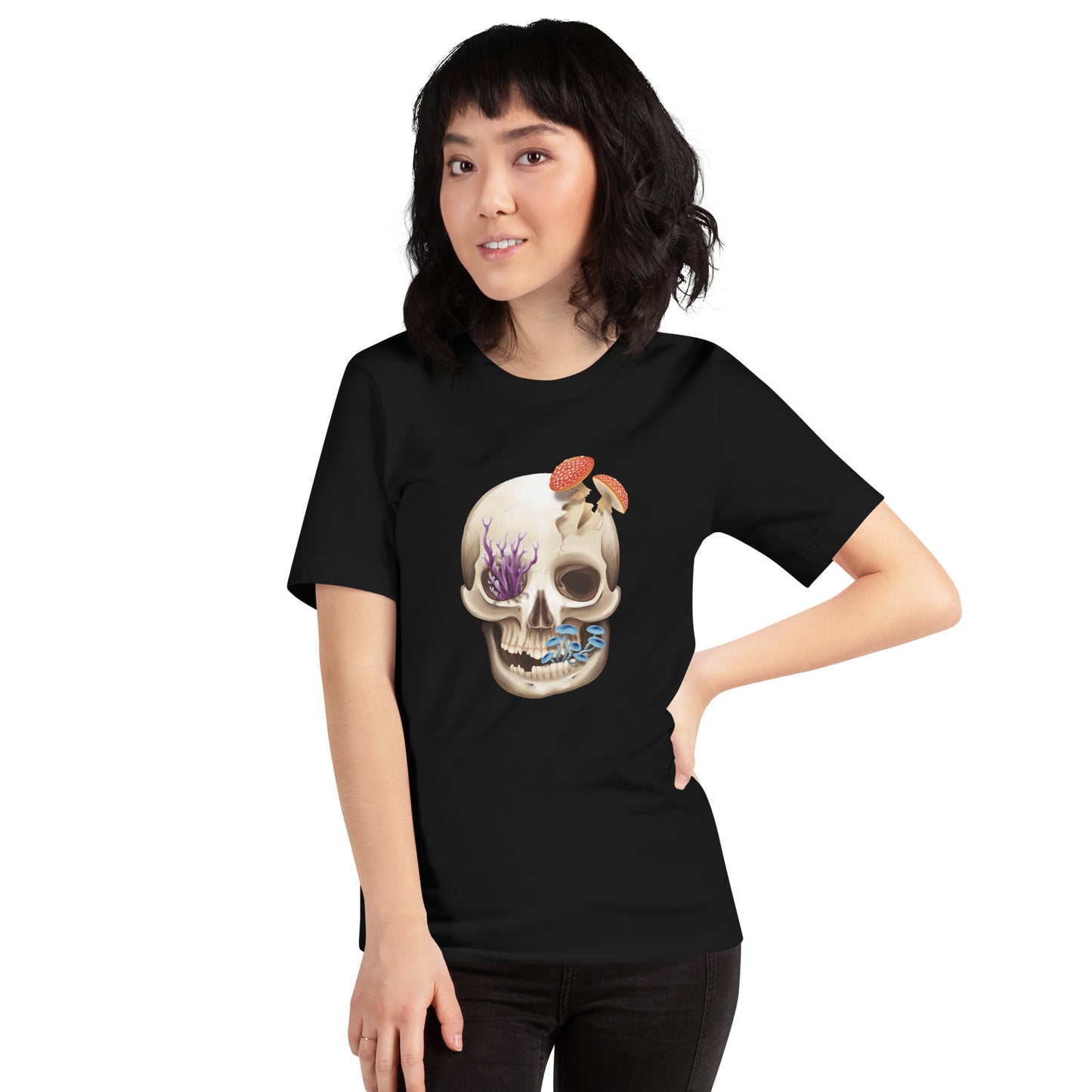 A unisex, black, adult short sleeve T shirt featuring a front facing human skull with 3 different kinds of fungi growing out of it