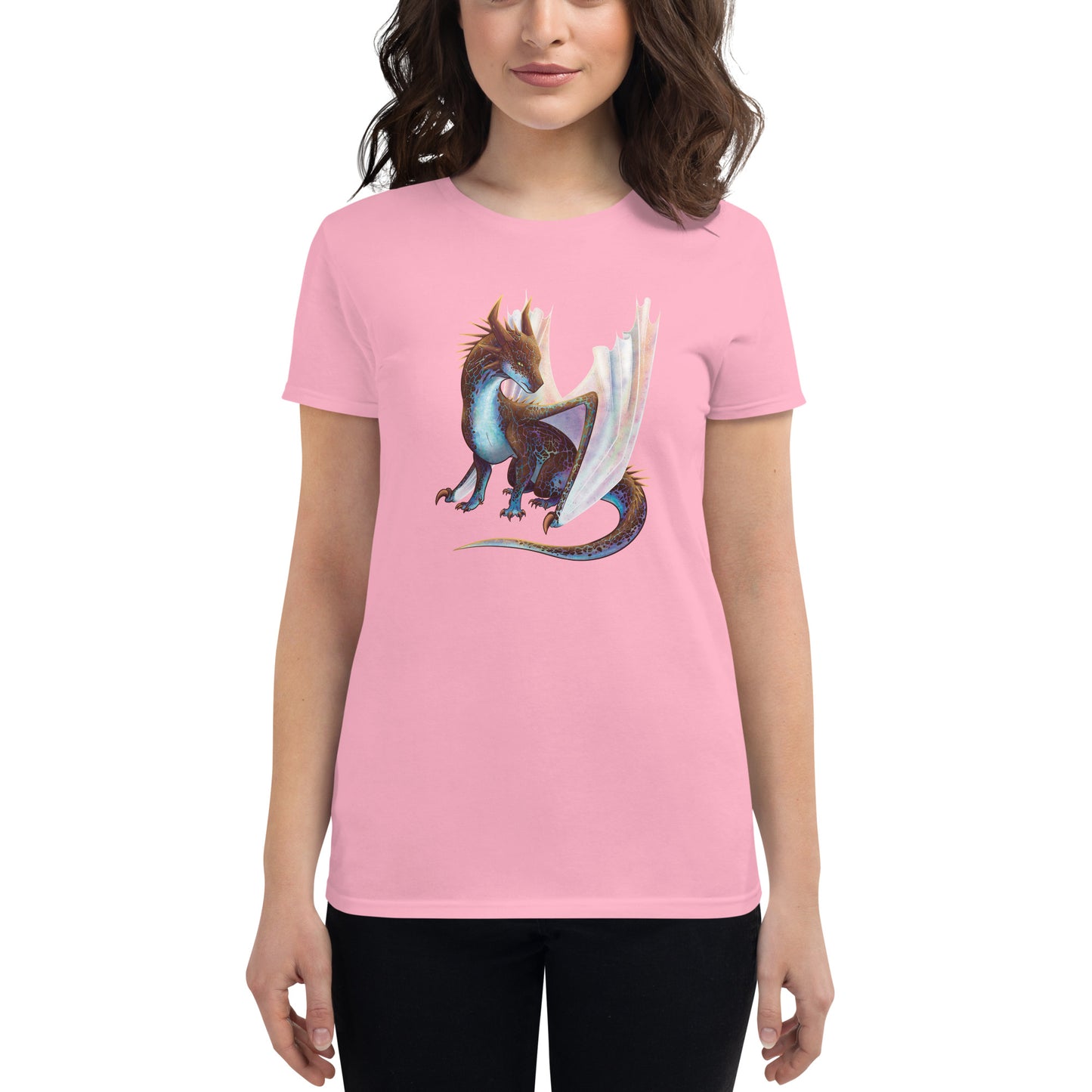 Unisex, light pink in color, adult women's short sleeve tee shirt featuring a sitting, side profile of a dragon that has the features of a boulder opal with hues of blue, green, purple, and pink on the underbelly and cracks of the rough, brown hue, rock scales. The wings are tucked back and are of an iridescent shimmery hue