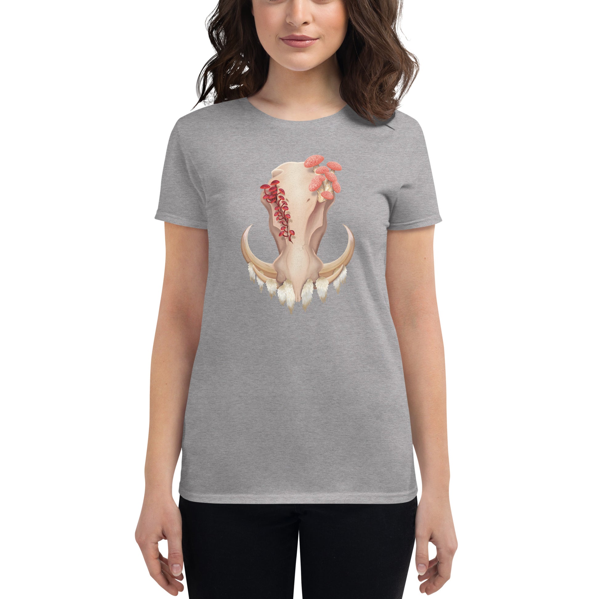 A woman wearing a fitted heather grey colored T shirt featuring a front facing warthog skull with 3 different kinds of fungi growing out of it