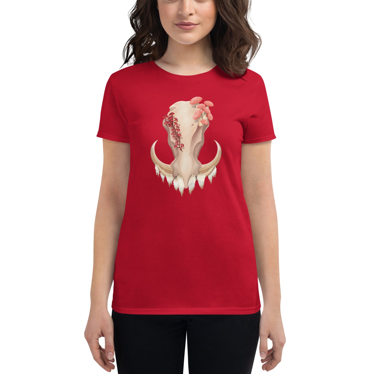 A woman wearing a fitted red colored T shirt featuring a front facing warthog skull with 3 different kinds of fungi growing out of it