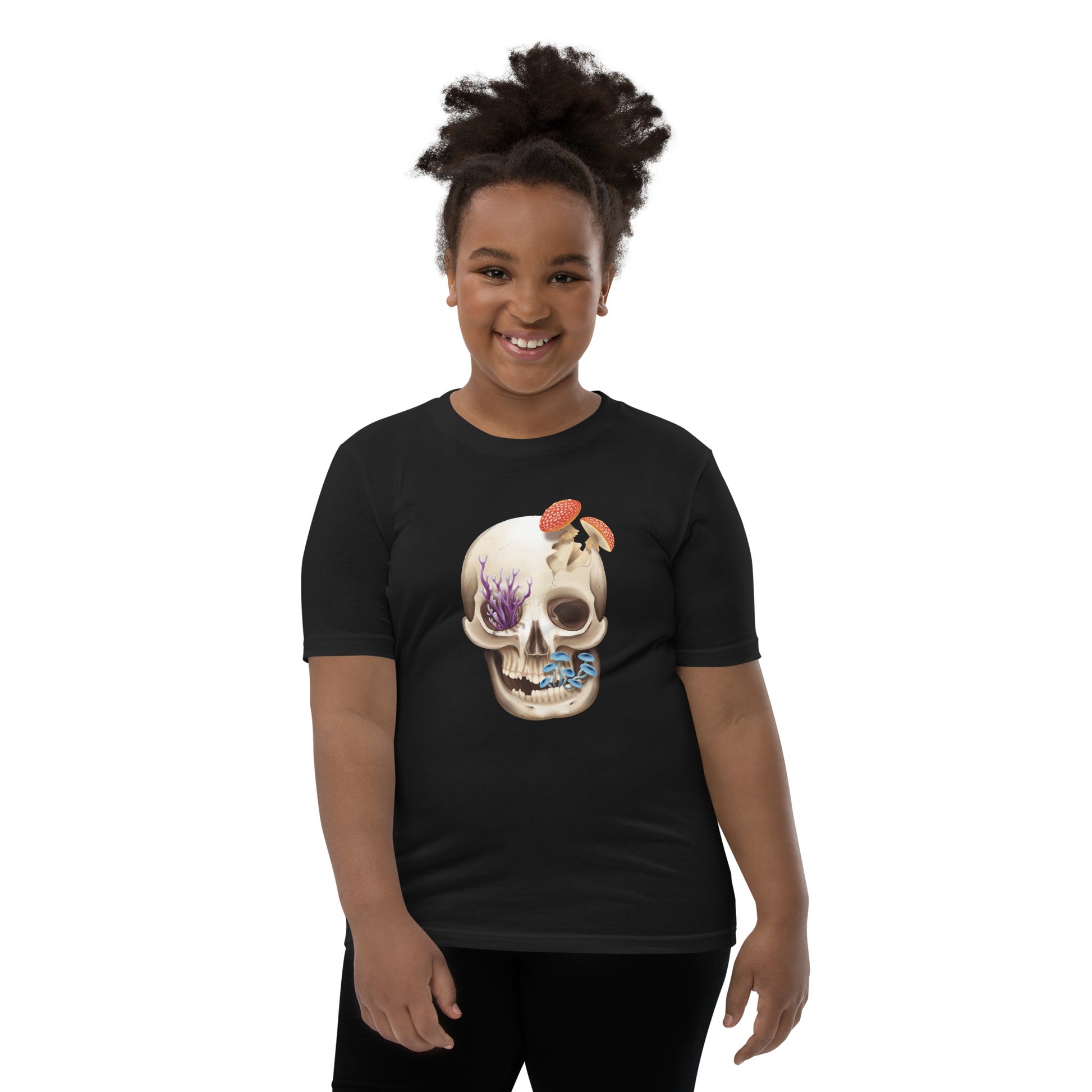 A unisex youth sized, black in color, short sleeve t shirt featuring a human skull with various kinds of fungi growing out of it